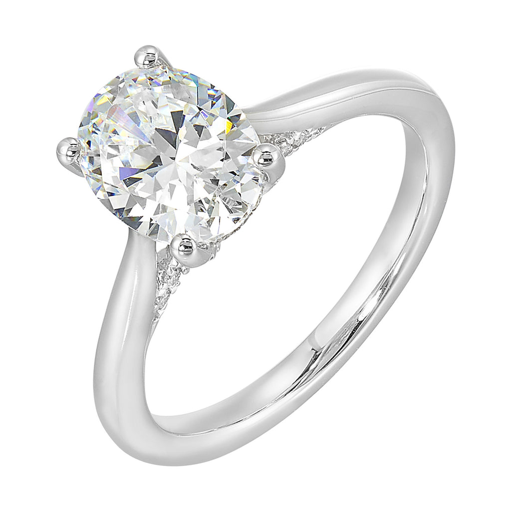14K white gold ring with round diamond.