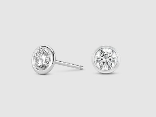 14K white gold diamond stud earrings.