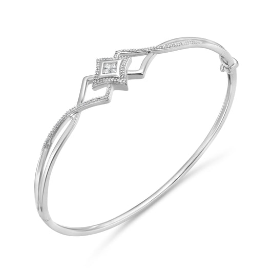 10K white gold bracelet with diamond accents.