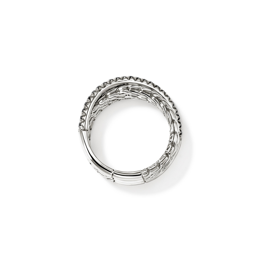Sterling silver ring with intricate design.