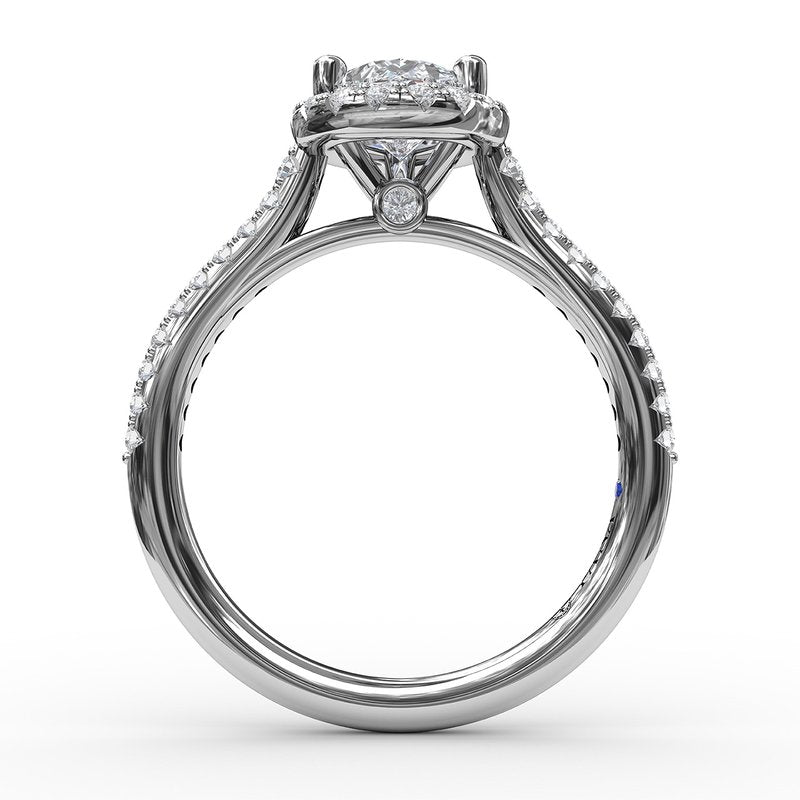 14K white gold diamond halo ring.