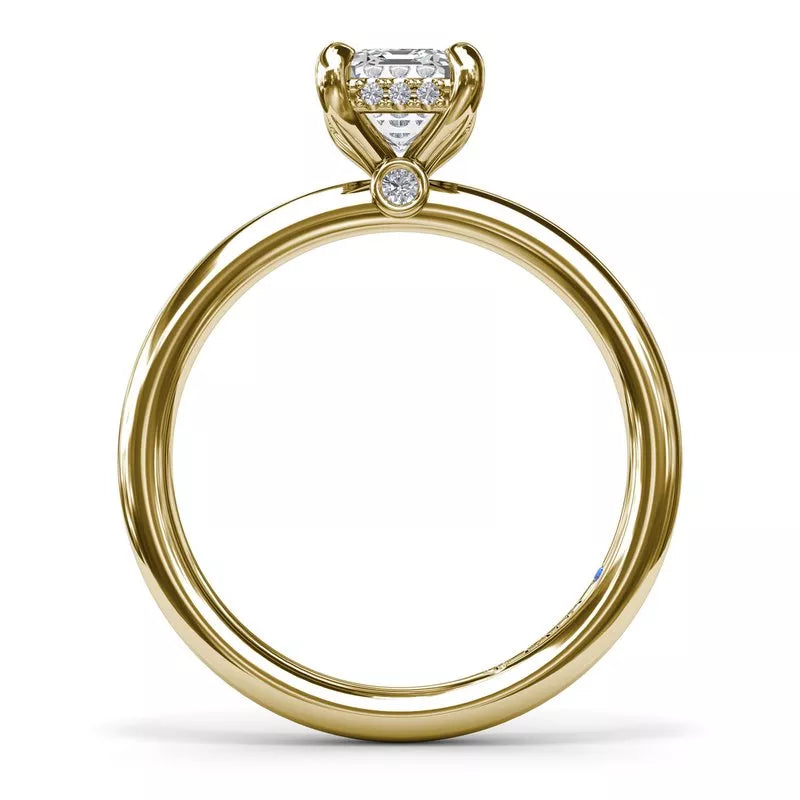 14K yellow gold solitaire ring with diamond accents.