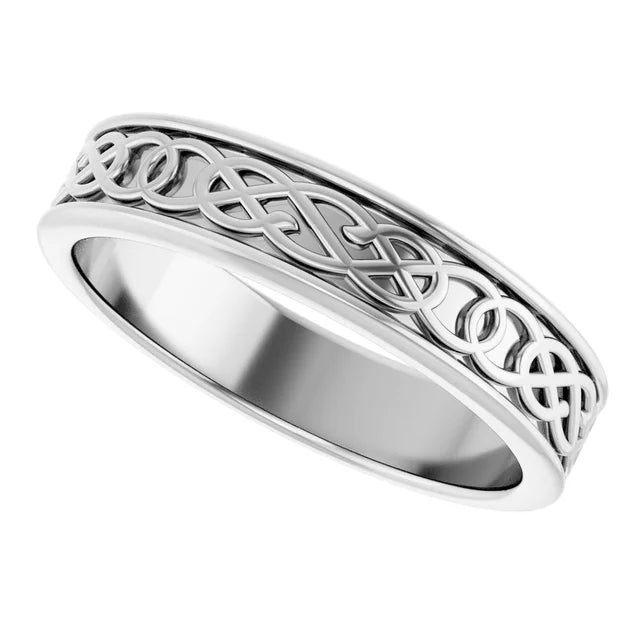 Carved white gold band with intricate design.