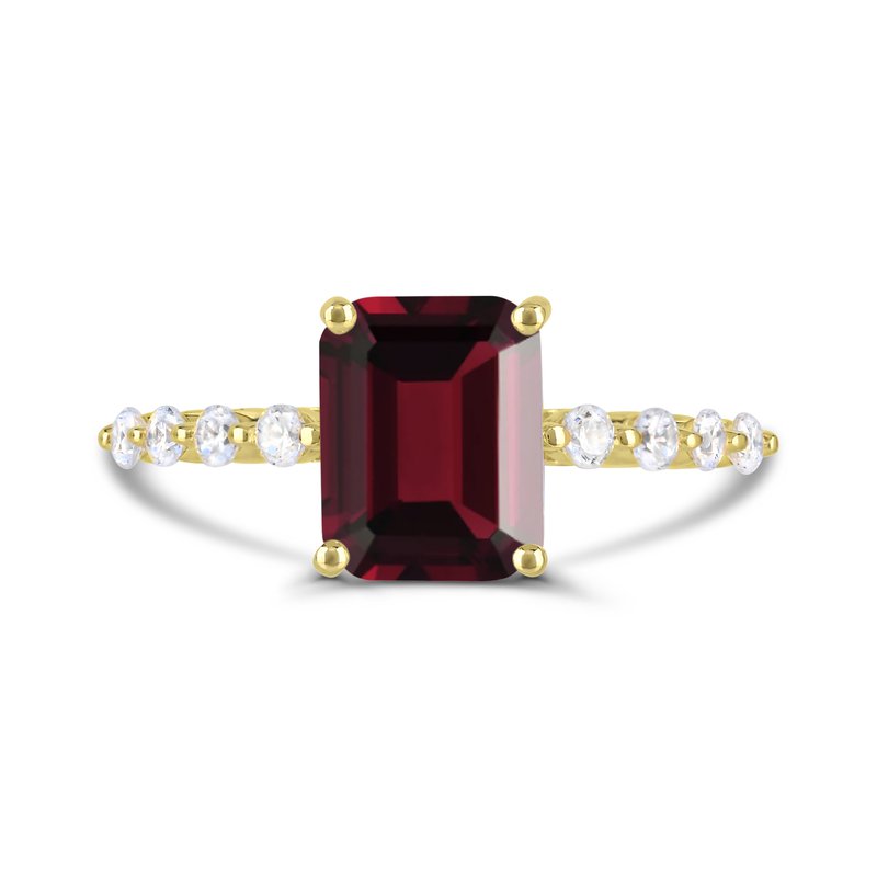 Emerald garnet ring with diamond accents.