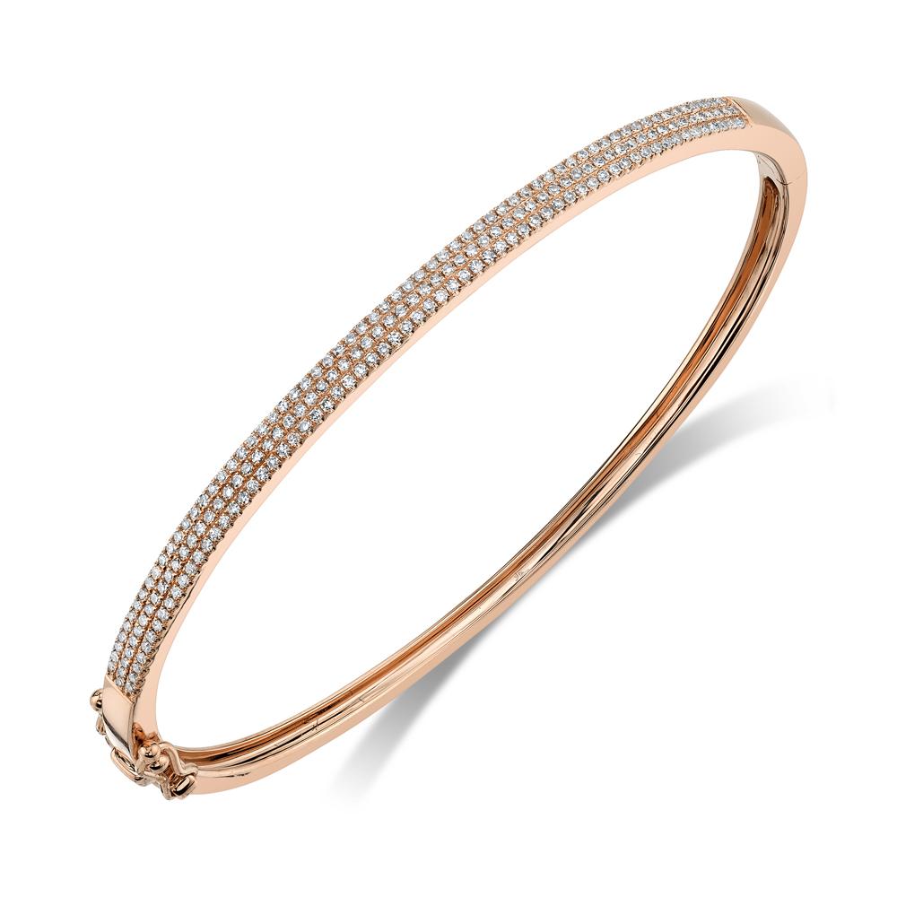 Rose gold bracelet with round diamonds.