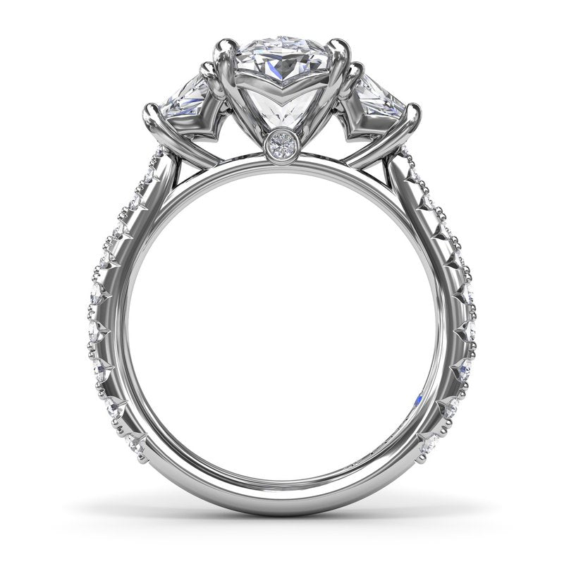 Three-stone diamond ring in white gold.