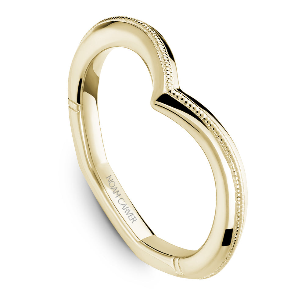 Yellow gold ring with milgrain detailing.