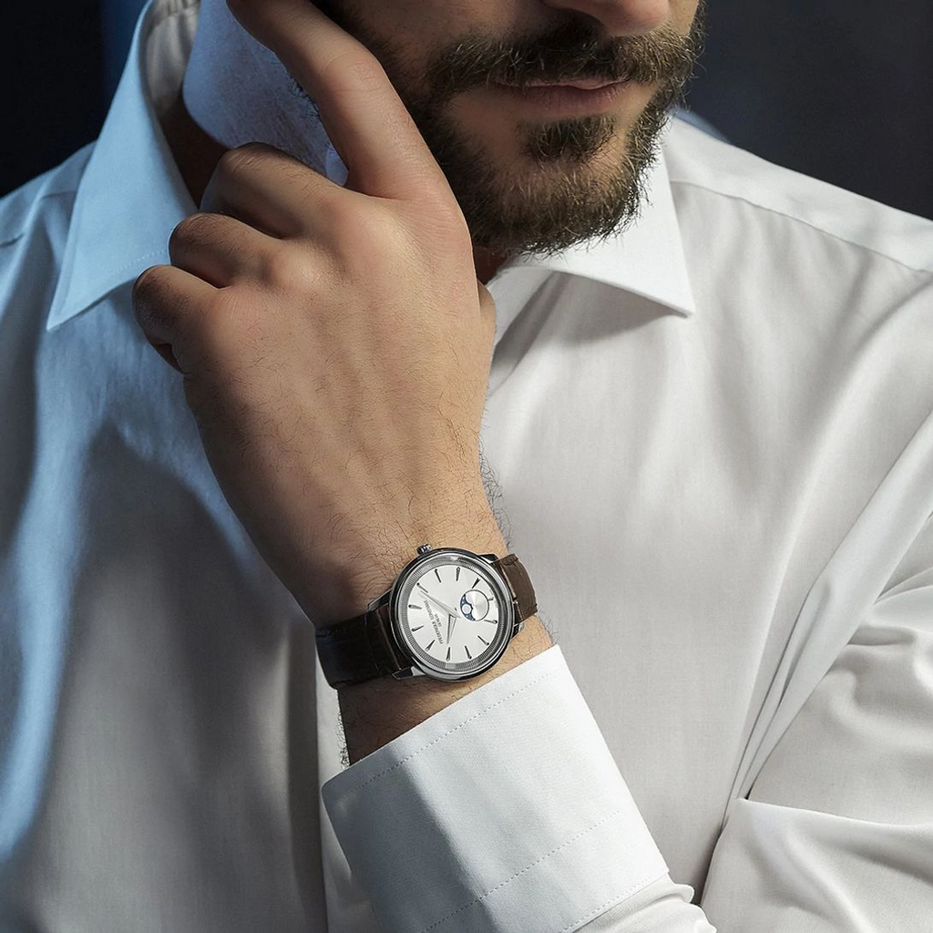 Silver dial watch, brown calfskin band, stainless steel.