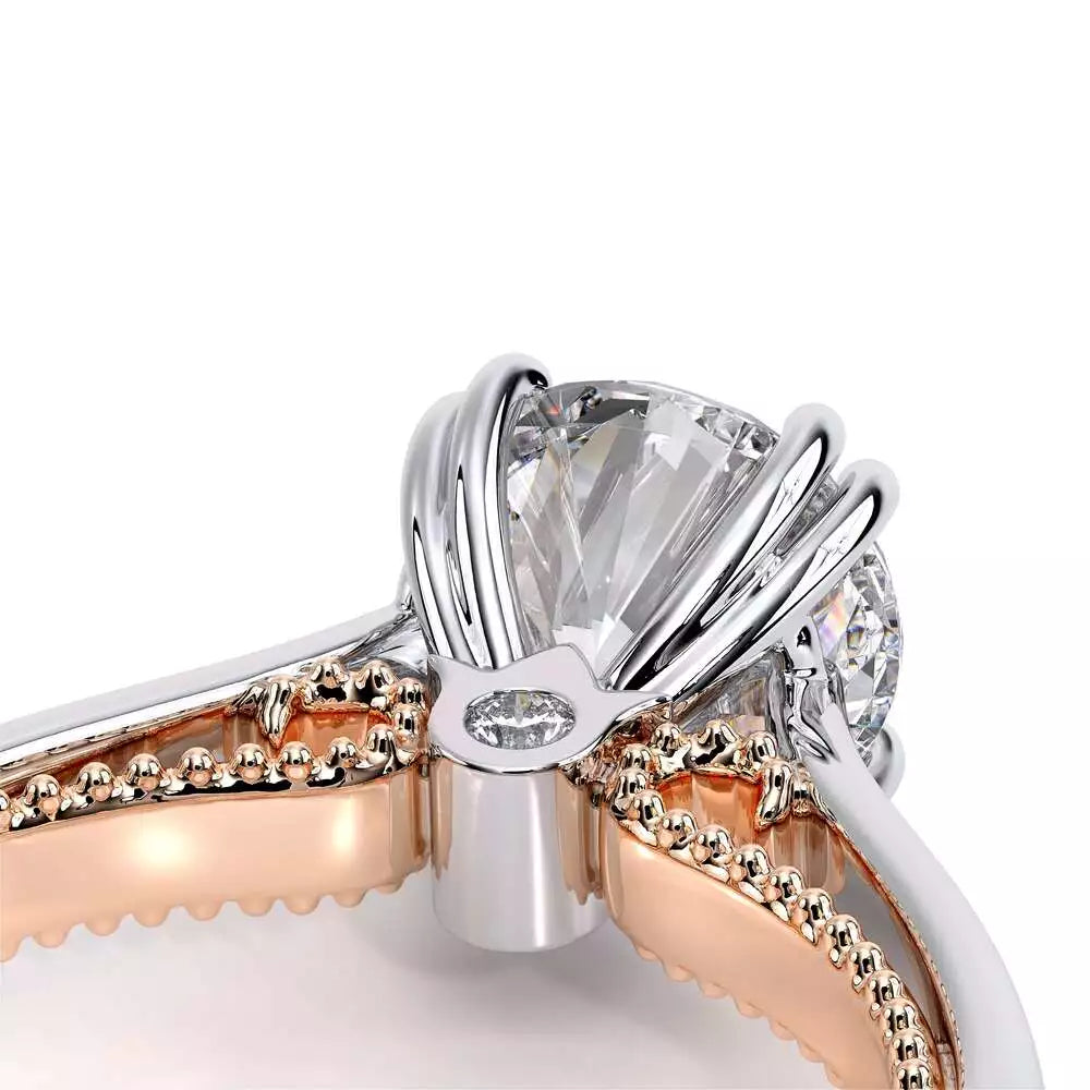 White and rose gold ring with diamonds.