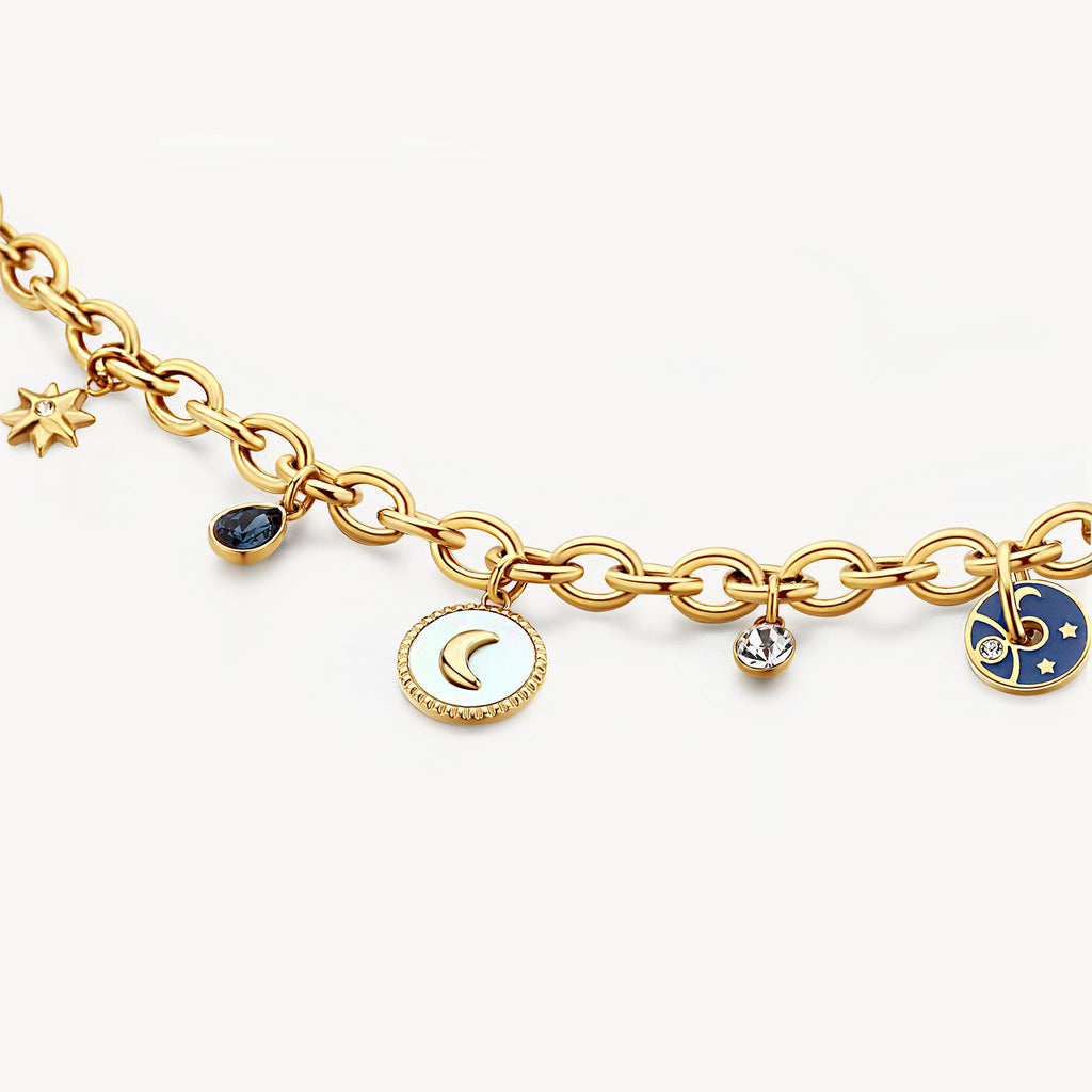 Yellow stainless steel bracelet with moon and star charms.