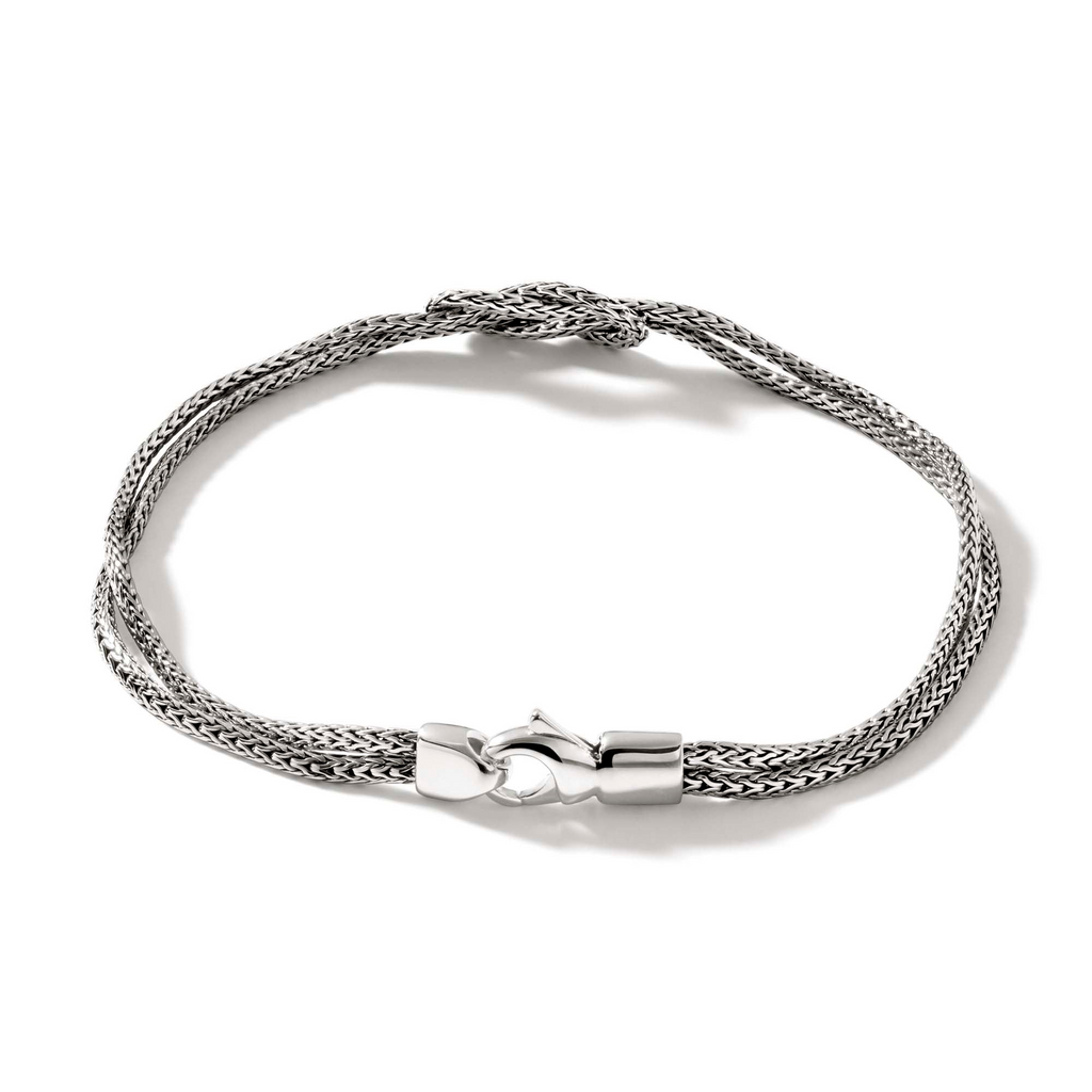 Sterling silver woven bracelet with lobster clasp.