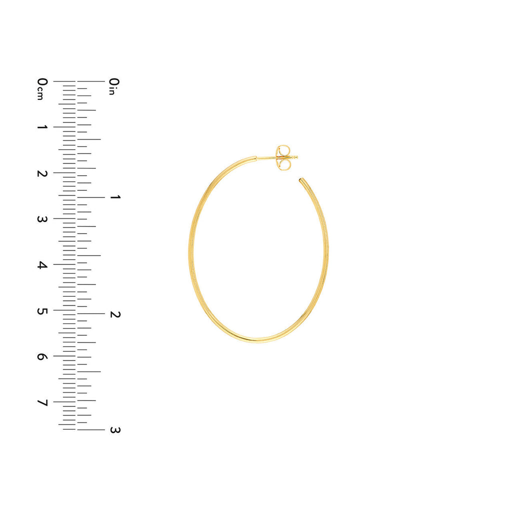 Oval 14K yellow gold hoop earring.
