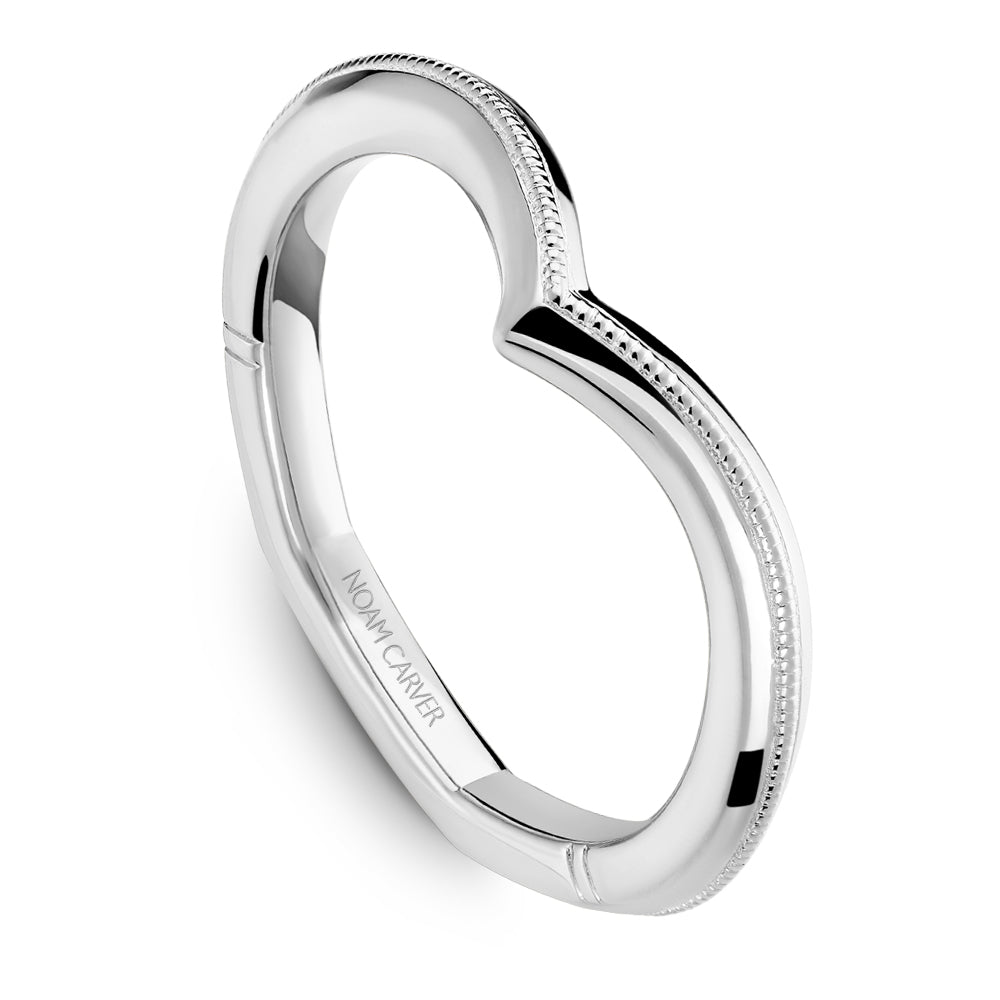 White gold engagement ring with milgrain detail.