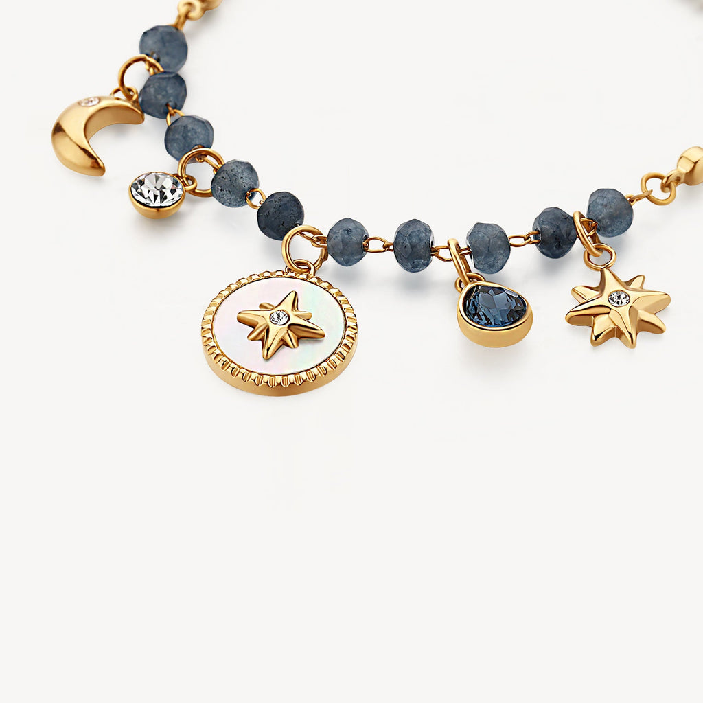 Yellow bracelet with blue gemstone charms.