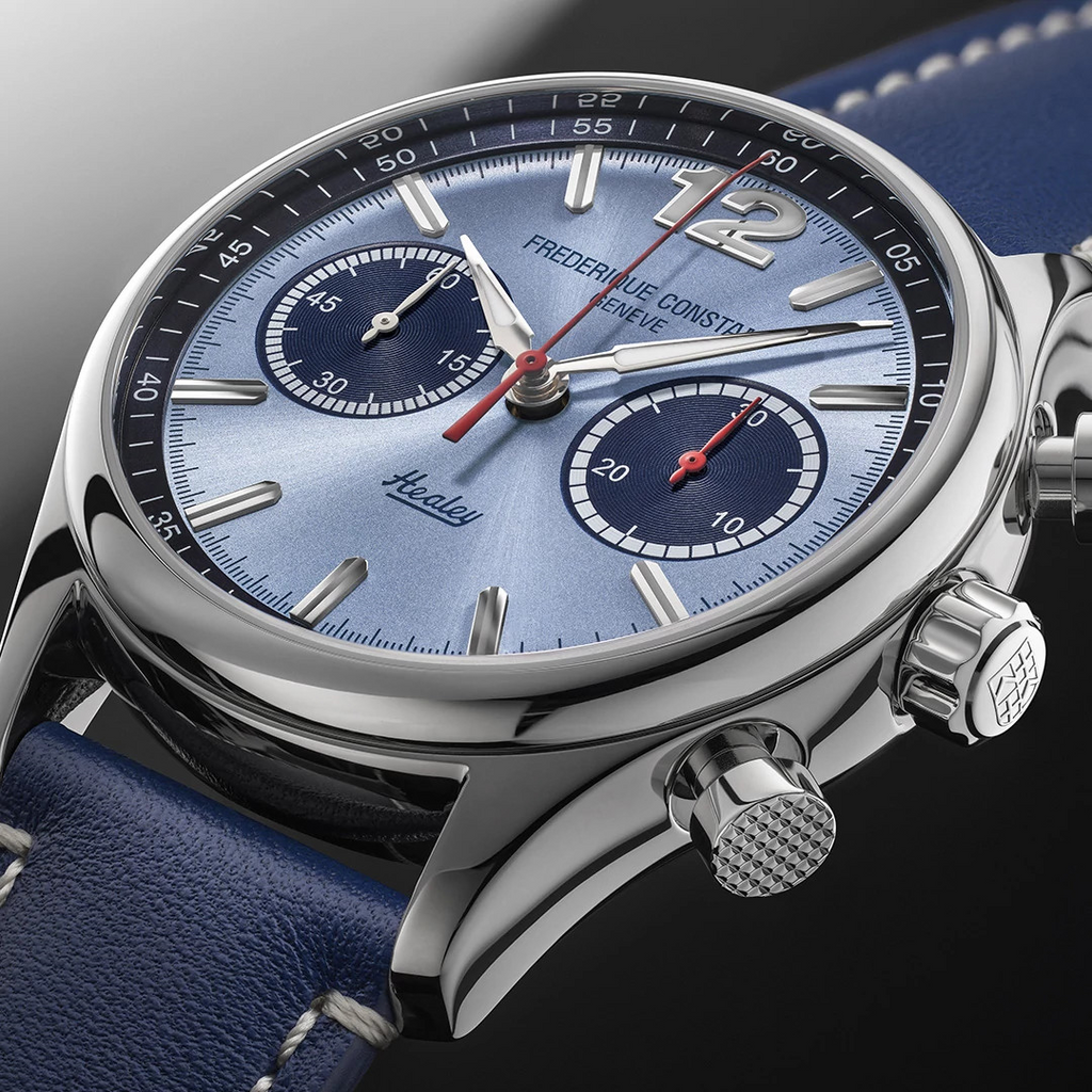 Light blue dial, stainless steel case, blue strap.