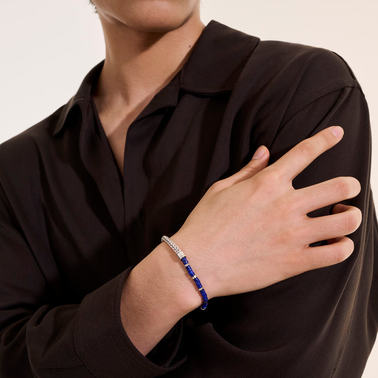 Sterling silver bracelet with round lapis links.