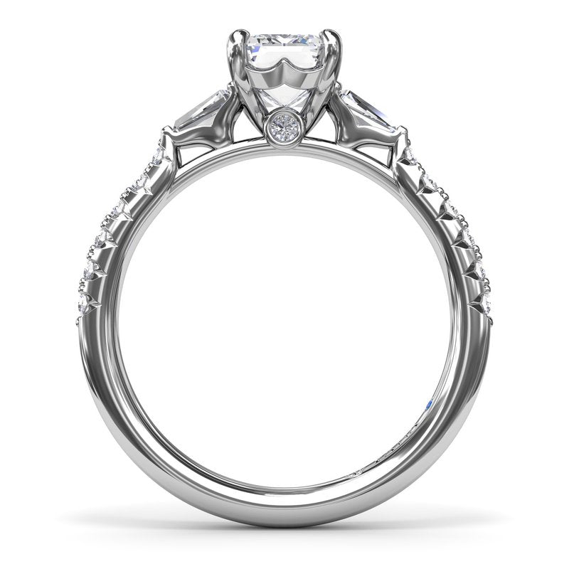 Three-stone diamond ring in white gold.