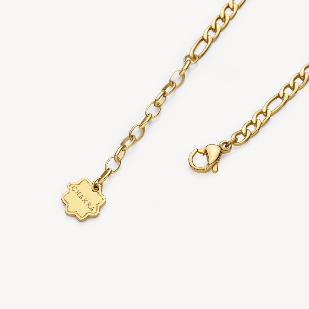 Yellow stainless steel bracelet with lobster clasp.