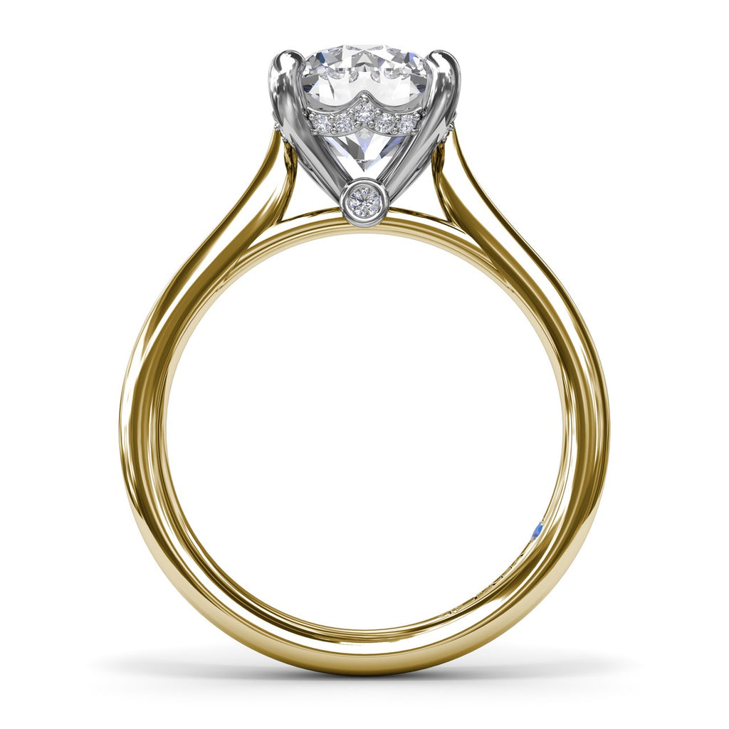 14K yellow gold solitaire diamond ring.