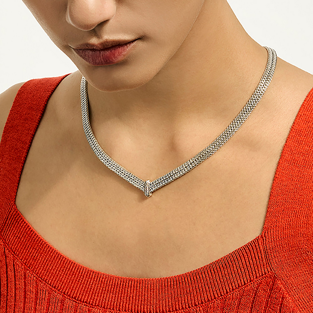 Sterling silver collar necklace with diamonds.