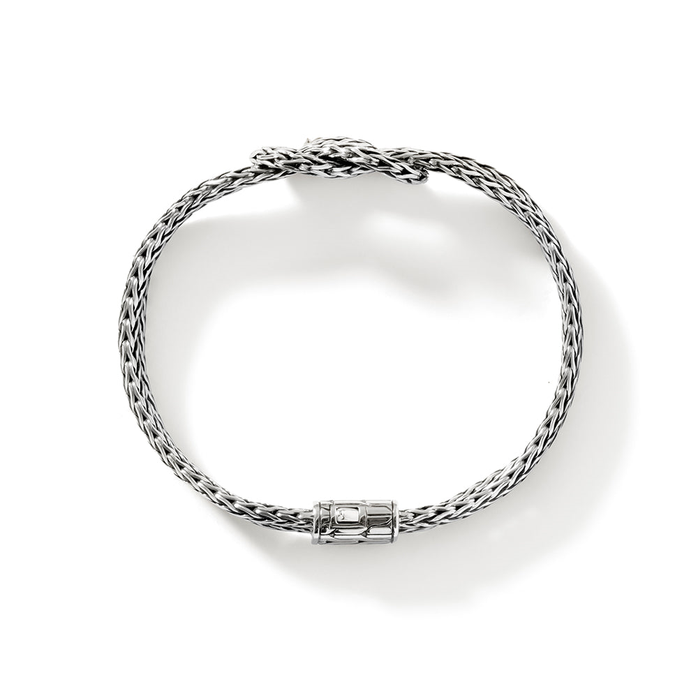 Sterling silver woven bracelet with hidden clasp.