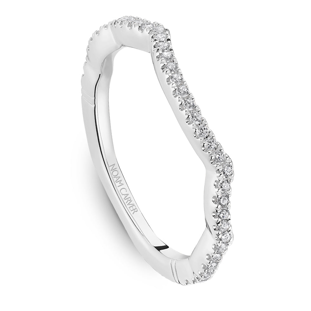 Diamond-accented white gold engagement ring.
