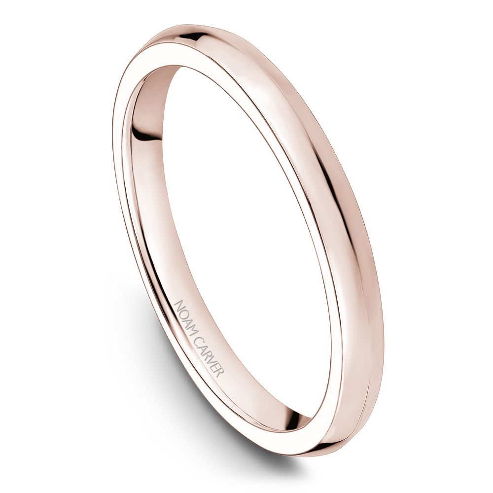 Polished rose gold carved band ring.