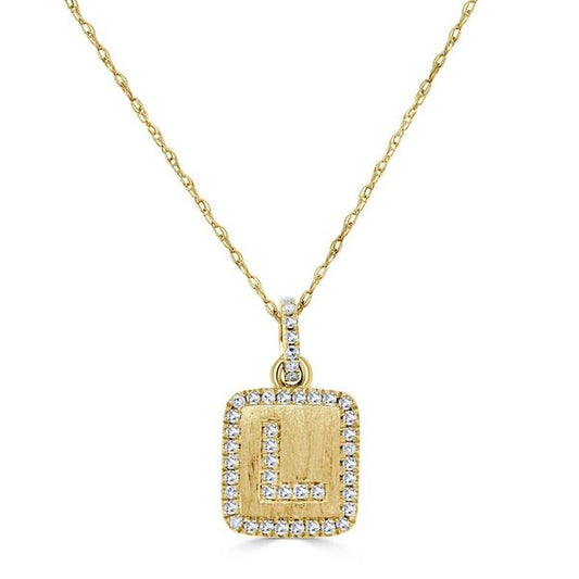 Yellow gold initial necklace with diamonds.