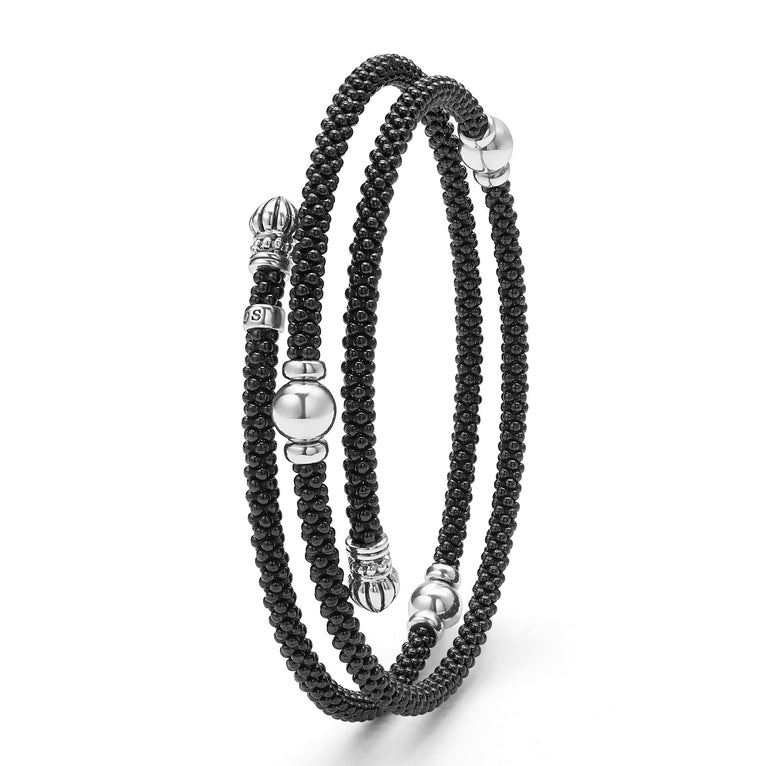 Black beaded bracelet with silver accents.