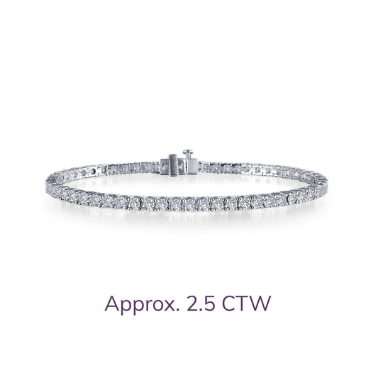 Platinum tennis bracelet with simulated diamonds.