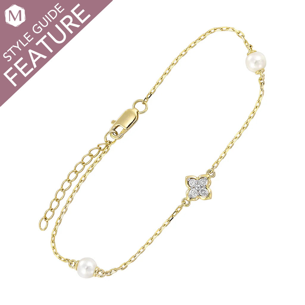 Yellow gold bracelet with diamonds and pearls.