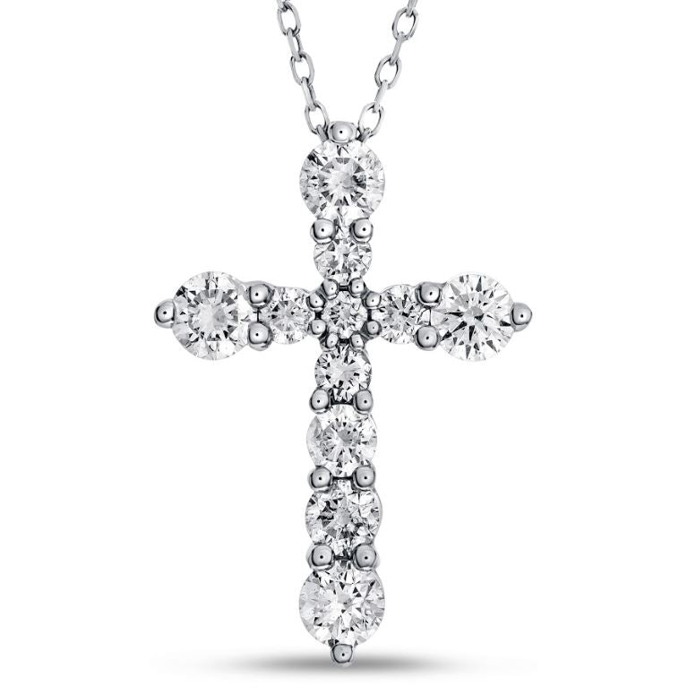 Diamond cross pendant on white gold chain.