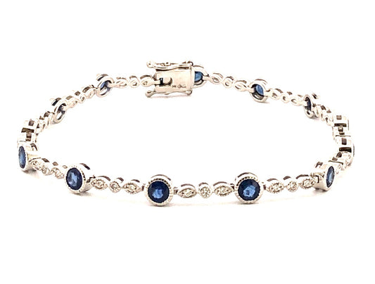 Color Gemstone Bracelet in 14 Karat White with 14 Round Sapphires 3.22ctw