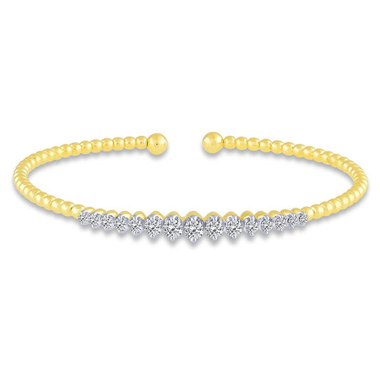 14K yellow gold bracelet with round diamonds.