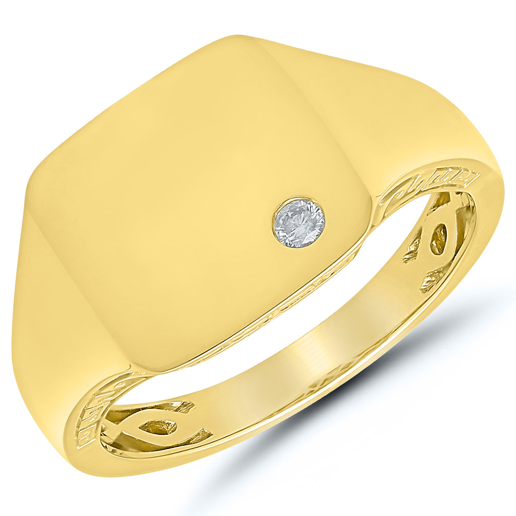 Yellow gold ring with single round diamond.