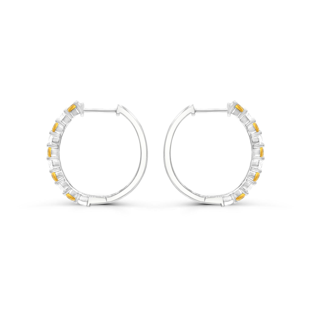Sterling silver hoops with citrine gemstones.