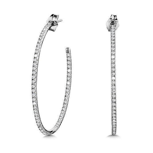 14K white gold diamond hoop earrings.