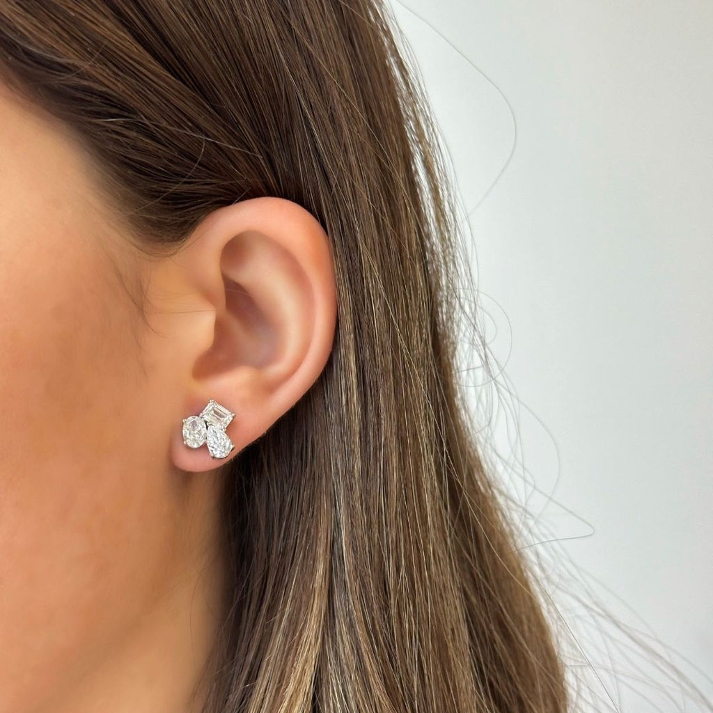 Lab-grown diamond stud earrings in yellow gold.