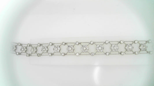 Diamond bracelet with floral design in white gold.