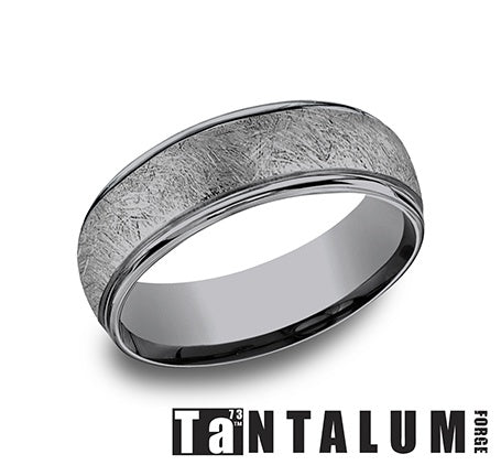Tantalum grey carved band with hammered finish.