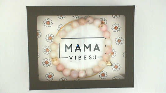 Pink opal stretch bracelet with gold accents.