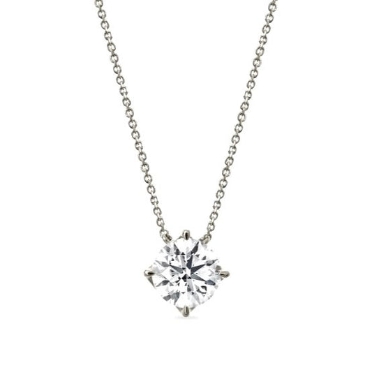 Lab-grown diamond pendant on yellow gold chain.