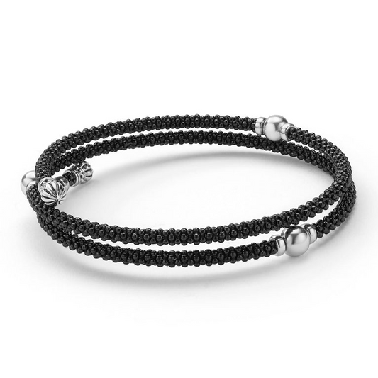 Black beaded bracelet with silver accents.
