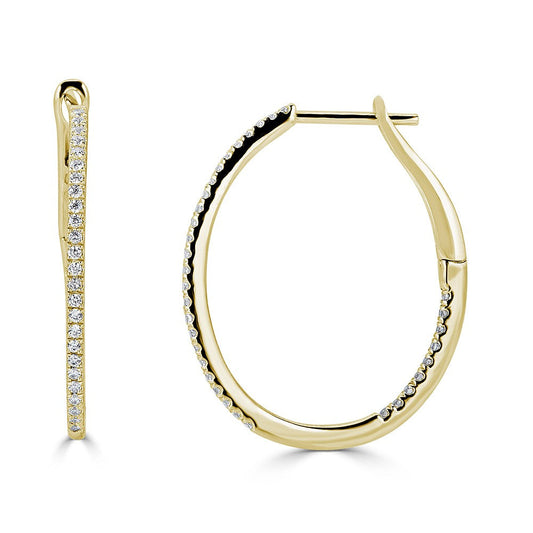 Oval yellow gold diamond hoop earrings.