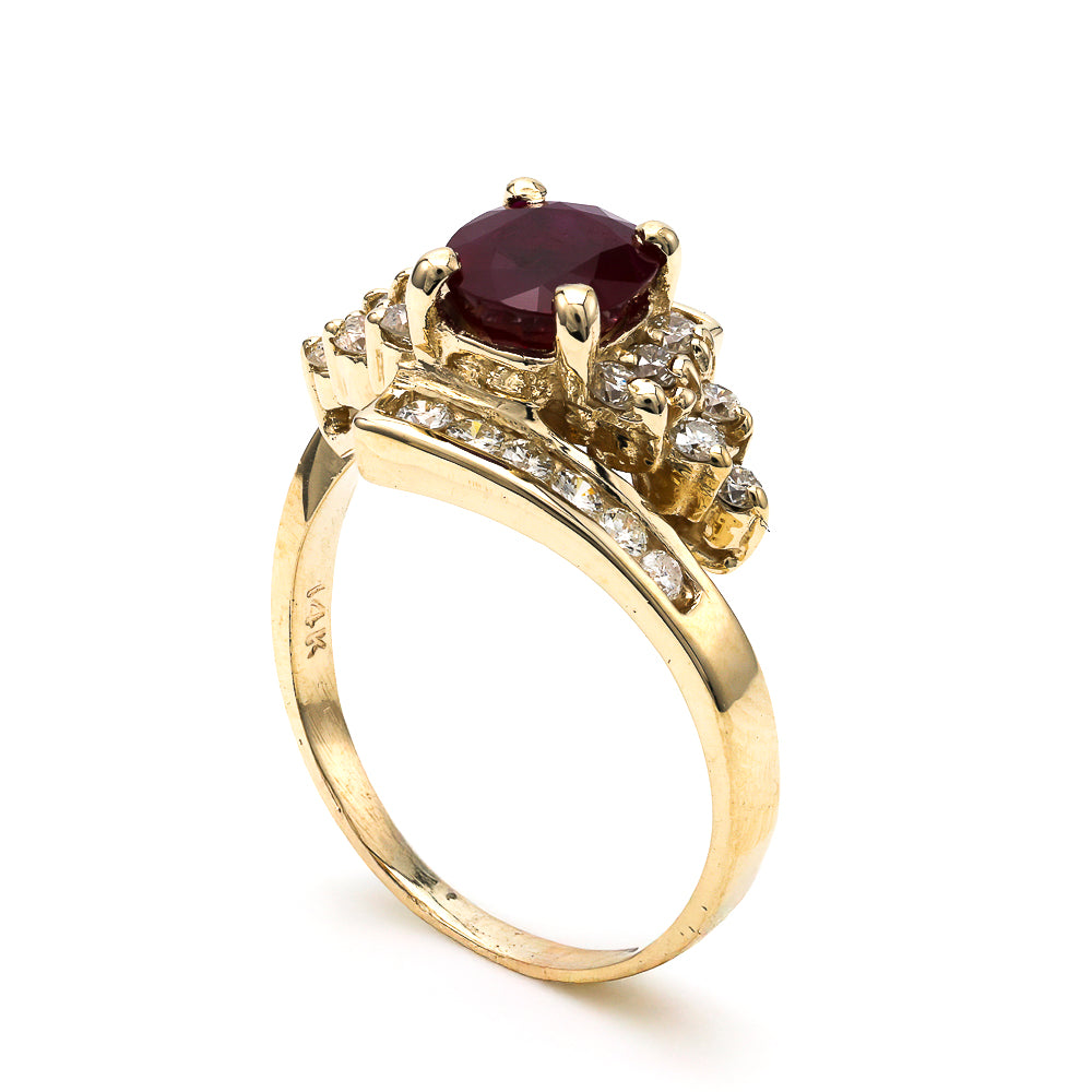 14k gold ring with oval ruby.