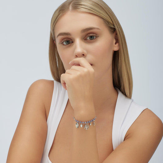 Stainless steel bracelet with colorful gemstones.