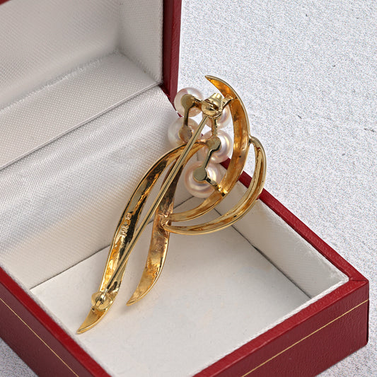 18K gold bar pin with white pearls.