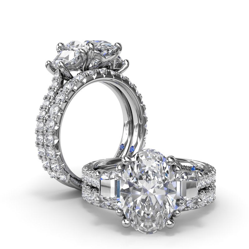 Three-stone diamond ring, white gold setting.