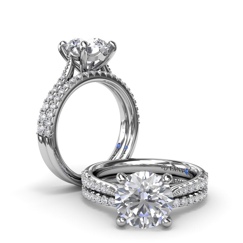 14K white gold diamond ring with side stones.