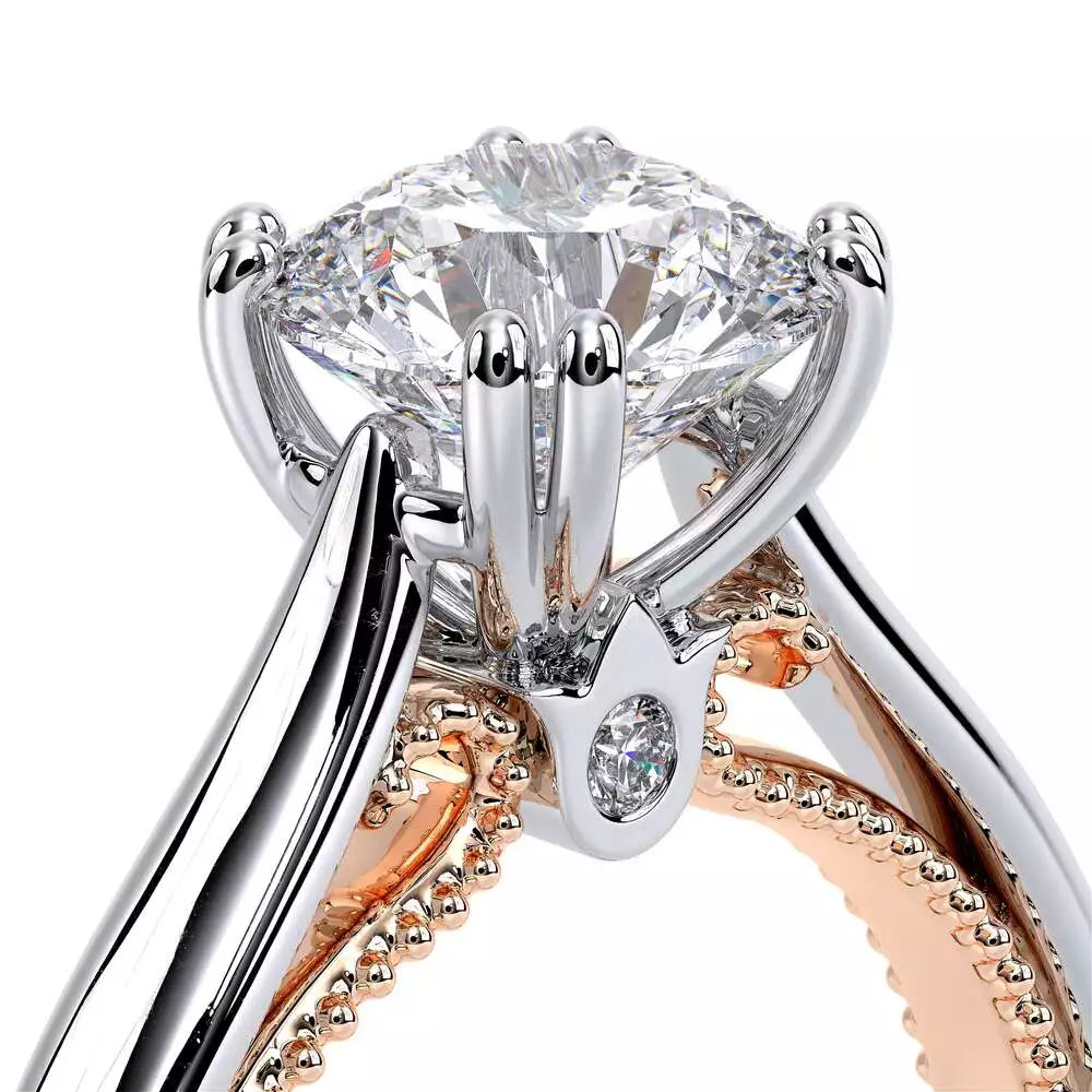 White and rose gold diamond engagement ring.